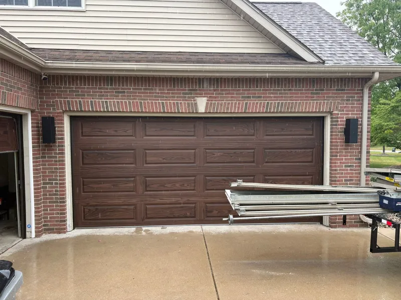 New wood-look garage door installed by DNA Garage Doors in South Bend, IN